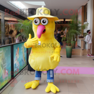 Lemon Yellow Flamingo mascot costume character dressed with a Jeans and Hats