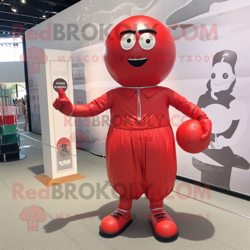 Red Human Cannon Ball mascot costume character dressed with a Romper and Handbags Red Human Cannon Ball mascot costume character dressed with a Romper and Handbags
