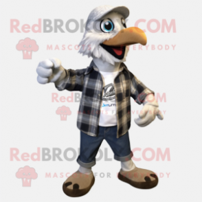 Silver Archeopteryx mascot costume character dressed with a Flannel Shirt and Shoe laces