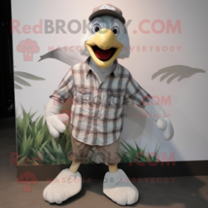 Silver Archeopteryx mascot costume character dressed with a Flannel Shirt and Shoe laces