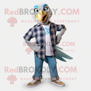 Silver Archeopteryx mascot costume character dressed with a Flannel Shirt and Shoe laces