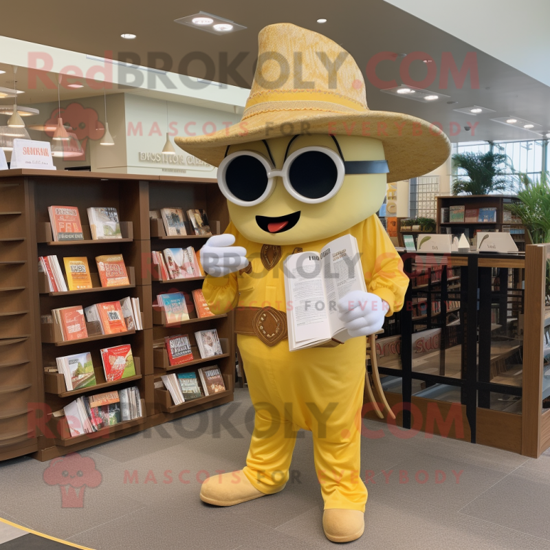 Gold Enchiladas mascot costume character dressed with a Chinos and Reading glasses