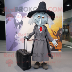 Gray Witch mascot costume character dressed with a Blazer and Briefcases