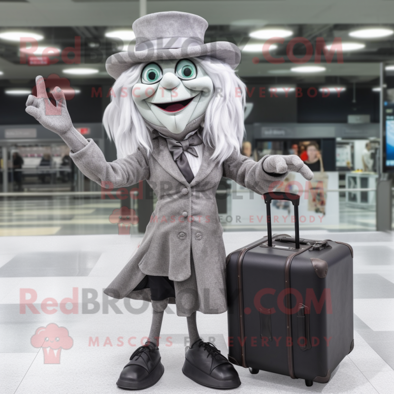 Gray Witch mascot costume character dressed with a Blazer and Briefcases Gray Witch mascot costume character dressed with a Blazer and Briefcases