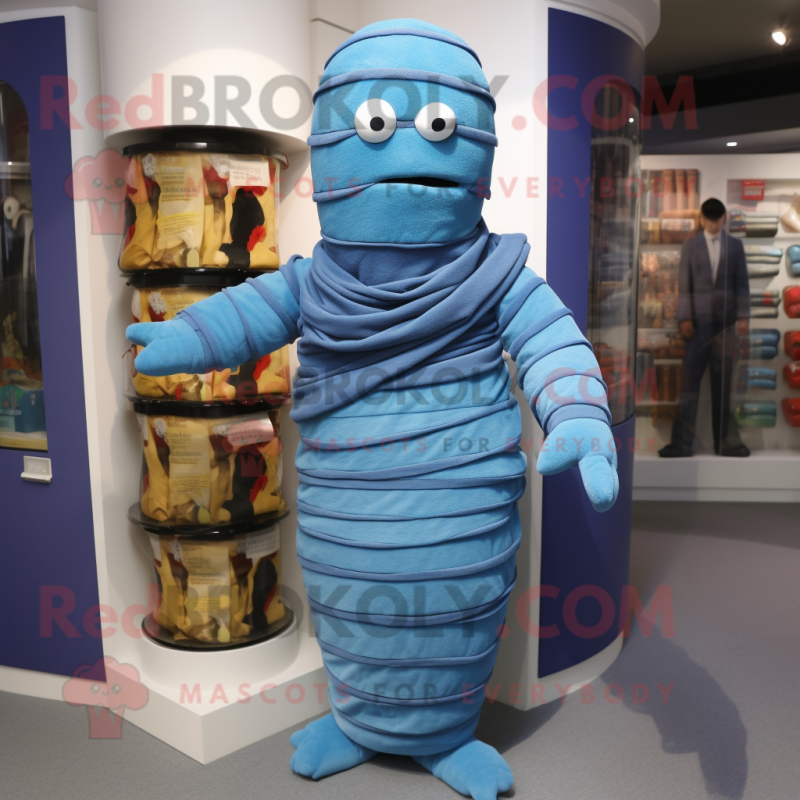 Blue Mummy mascot costume character dressed with a Cardigan and Cummerbunds