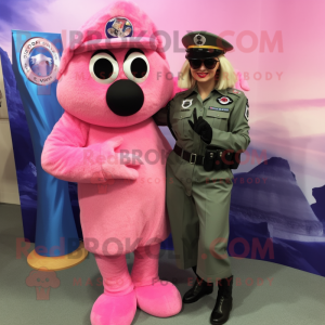 Pink Special Air Service mascot costume character dressed with a Dress and Rings