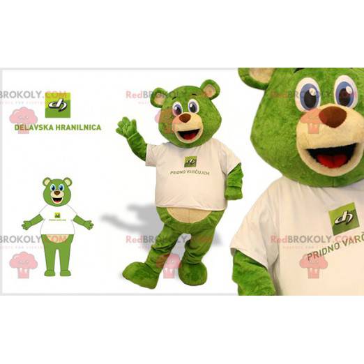 Green and beige teddy bear mascot with blue eyes -