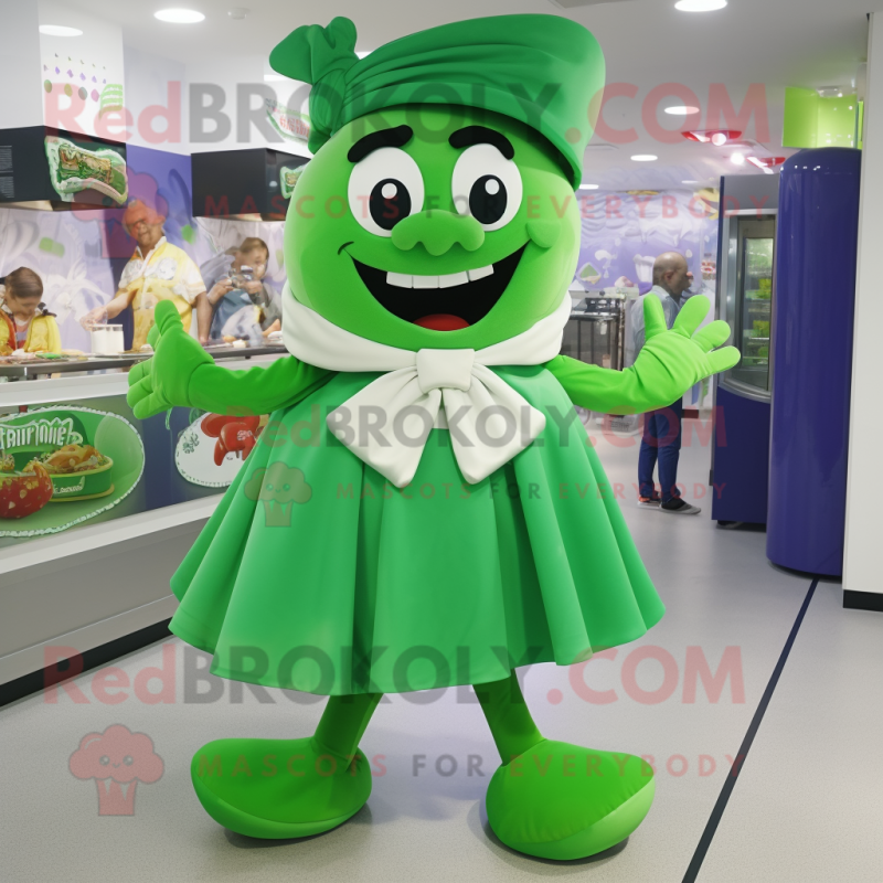 Green Goulash mascot costume character dressed with a A-Line Dress and Bow ties Green Goulash mascot costume character dressed with a A-Line Dress and Bow ties