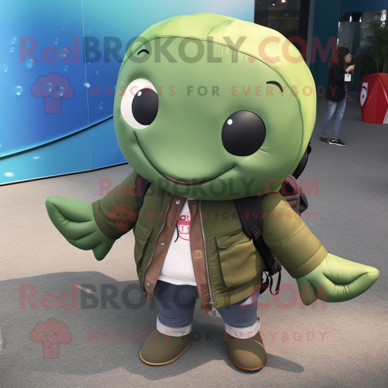 Olive Whale mascot costume character dressed with a Leather Jacket and Hair clips Olive Whale mascot costume character dressed with a Leather Jacket and Hair clips