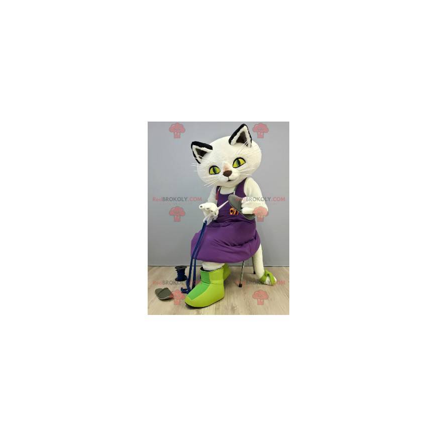 Vit kattmaskot med en lila klänning - Redbrokoly.com