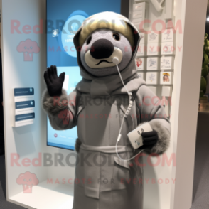 Gray Phone mascot costume character dressed with a Parka and Scarves