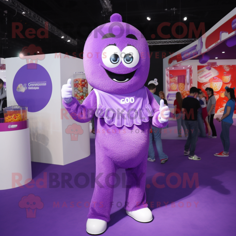 Purple Candy Box mascot costume character dressed with a Jumpsuit and Necklaces Purple Candy Box mascot costume character dressed with a Jumpsuit and Necklaces