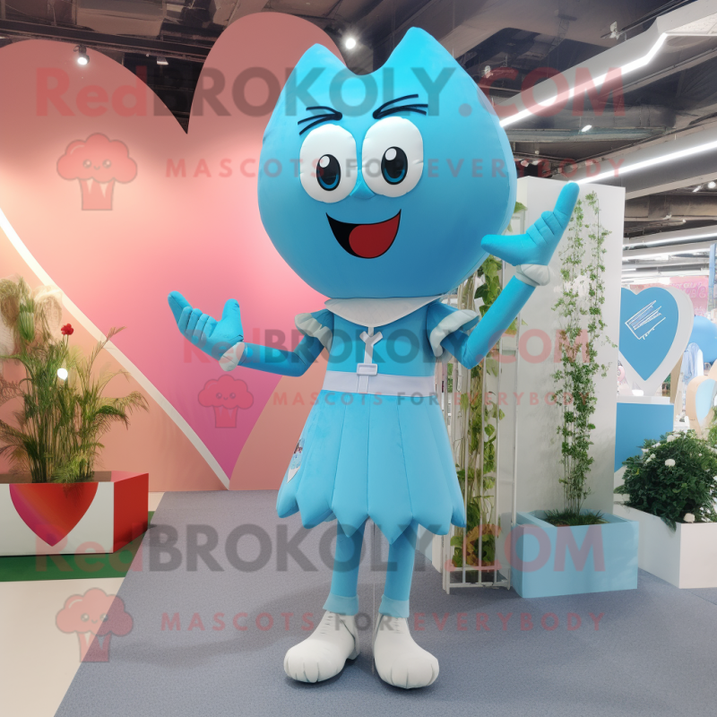 Cyan Arrow Of Love mascot costume character dressed with a Midi Dress and Suspenders Cyan Arrow Of Love mascot costume character dressed with a Midi Dress and Suspenders