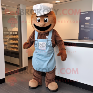 Brown Cupcake mascot costume character dressed with a Vest and Hats