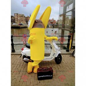Mascota gigante de la terminal telefónica amarilla -