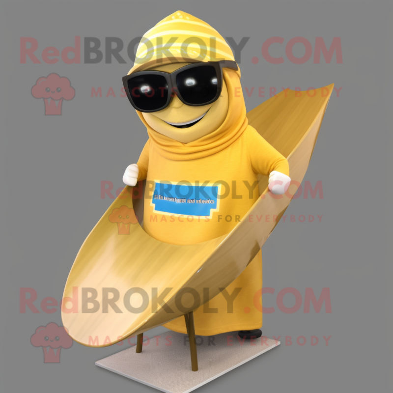 Gold Surfboard mascot costume character dressed with a Cover-up and Reading glasses Gold Surfboard mascot costume character dressed with a Cover-up and Reading glasses