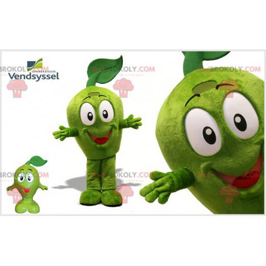 Mascotte della mela verde molto sorridente. Mela verde gigante