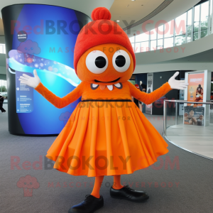 Orange Cyclops mascot costume character dressed with a Maxi Skirt and Berets