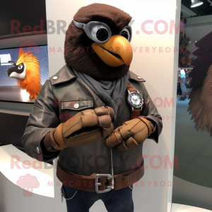 Brown Crow mascot costume character dressed with a Leather Jacket and Smartwatches