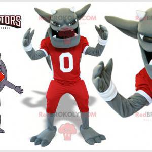 Mascota dragón gris gárgola con un traje de fútbol -