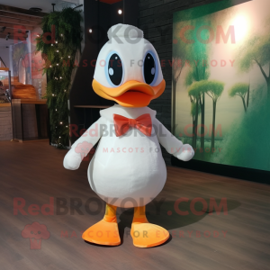 Peach Gosling mascot costume character dressed with a Long Sleeve Tee and Bow ties