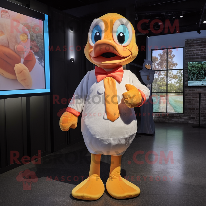 Peach Gosling mascot costume character dressed with a Long Sleeve Tee and Bow ties