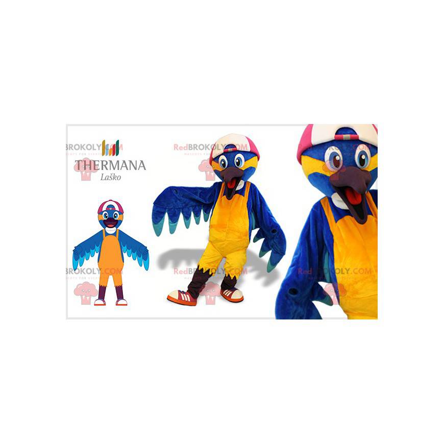 Blauwe en gele vogel mascotte met een pet - Redbrokoly.com