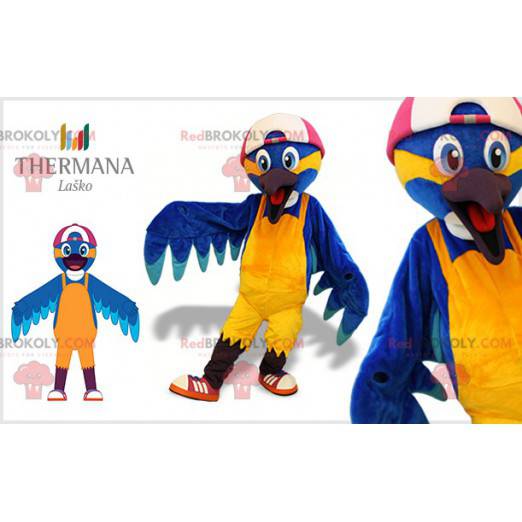 Blauwe en gele vogel mascotte met een pet - Redbrokoly.com