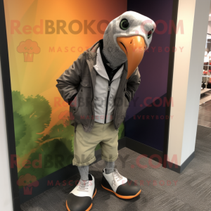 Gray Guinea Fowl mascot costume character dressed with a Moto Jacket and Shoe laces