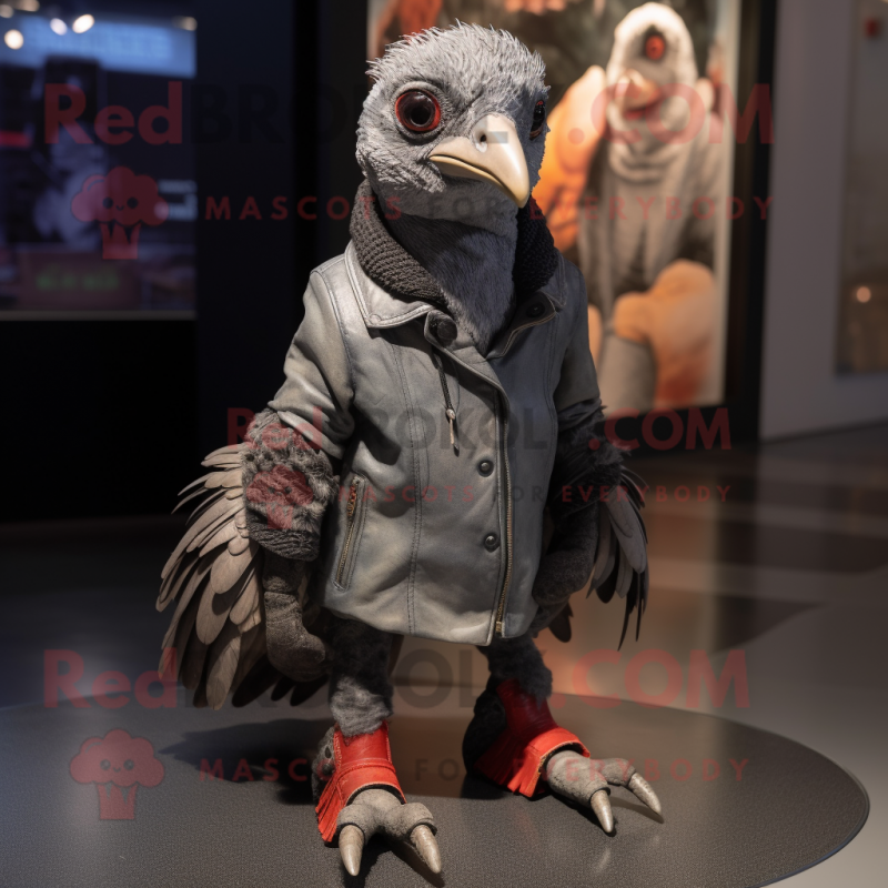 Gray Guinea Fowl mascot costume character dressed with a Moto Jacket and Shoe laces