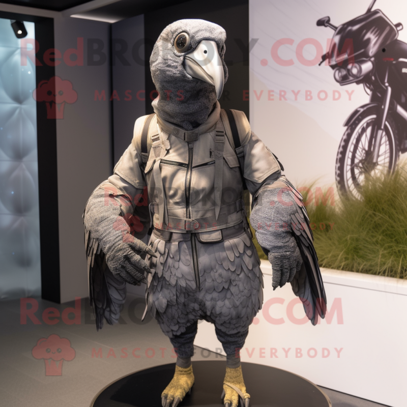 Gray Guinea Fowl mascot costume character dressed with a Moto Jacket and Shoe laces