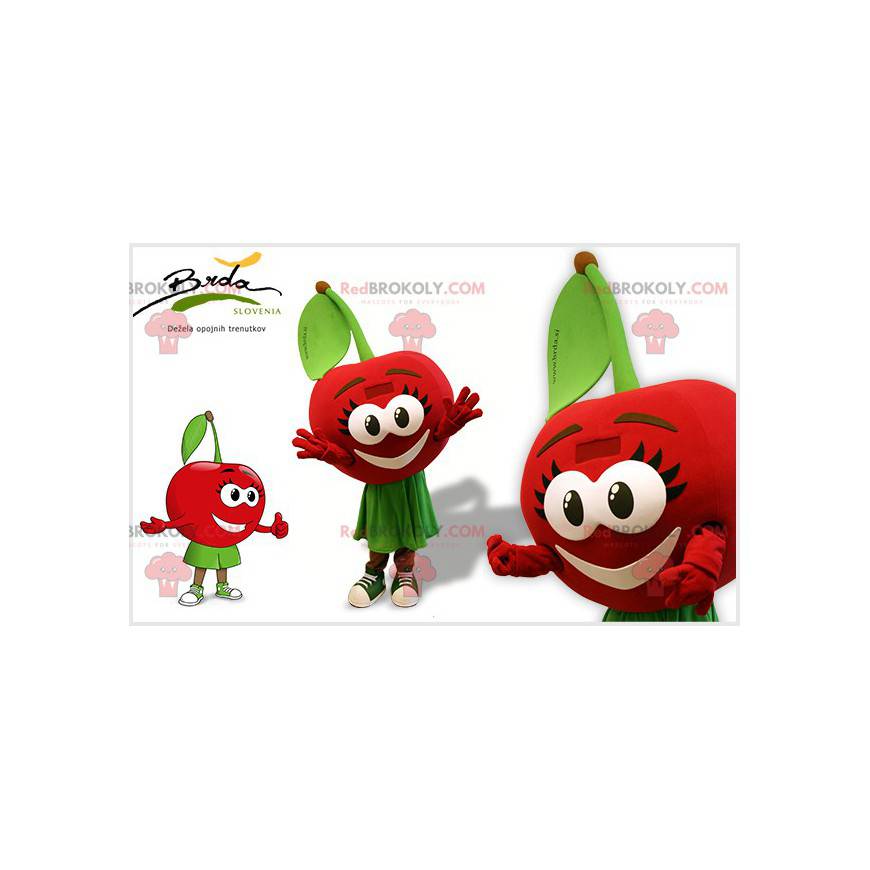 Mascotte de cerise rouge et verte avec de grands yeux -