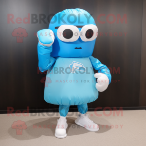 Sky Blue Boxing Glove mascot costume character dressed with a A-Line Skirt and Sunglasses