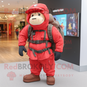 Red Special Air Service mascot costume character dressed with a Cover-up and Backpacks