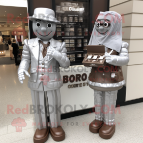 Silver Chocolate Bar mascot costume character dressed with a Dress Pants and Berets