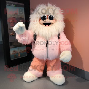 Peach Yeti mascot costume character dressed with a Leather Jacket and Shoe clips