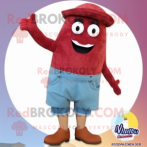 Maroon Paella mascot costume character dressed with a Denim Shorts and Mittens