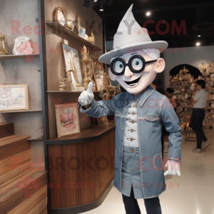 Silver Magician mascot costume character dressed with a Denim Shirt and Eyeglasses