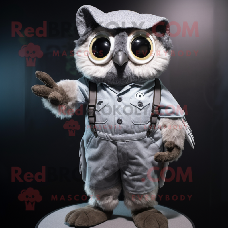 Gray Owl mascot costume character dressed with a Romper and Suspenders Gray Owl mascot costume character dressed with a Romper and Suspenders