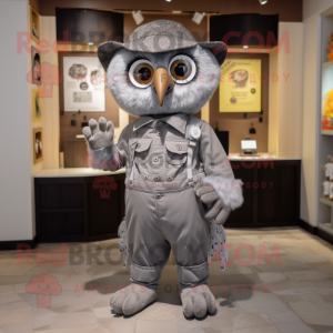 Gray Owl mascot costume character dressed with a Romper and Suspenders