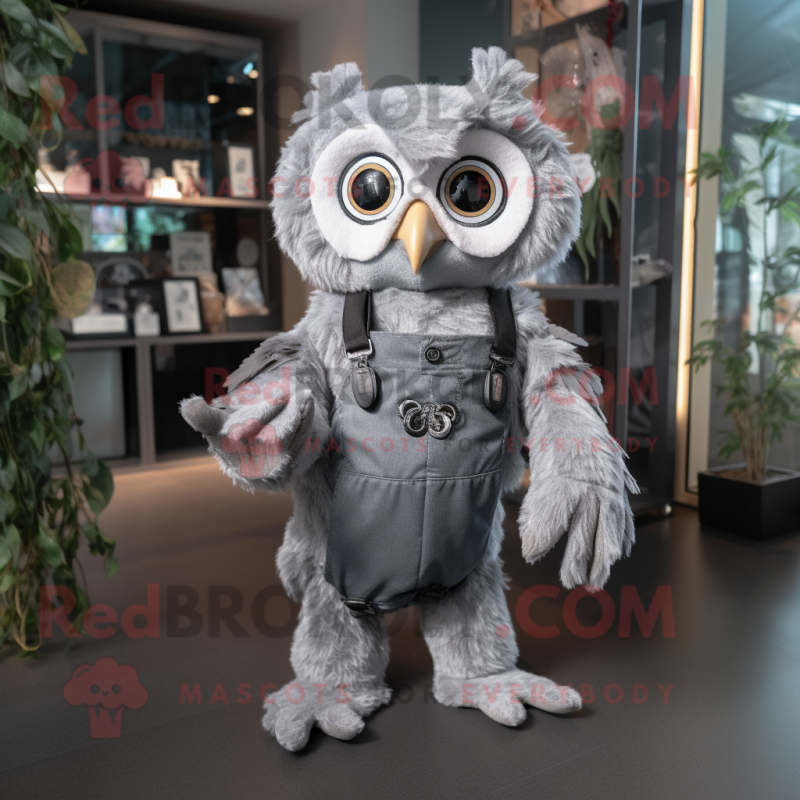 Gray Owl mascot costume character dressed with a Romper and Suspenders