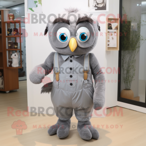 Gray Owl mascot costume character dressed with a Romper and Suspenders