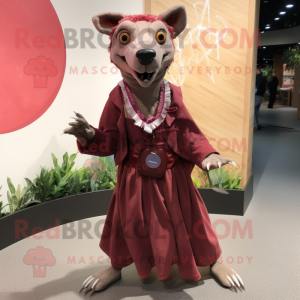 Maroon Thylacosmilus mascot costume character dressed with a Wrap Skirt and Brooches