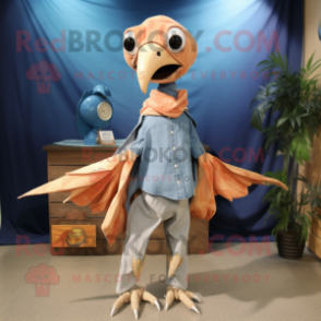 Peach Dimorphodon mascot costume character dressed with a Chambray Shirt and Shawl pins
