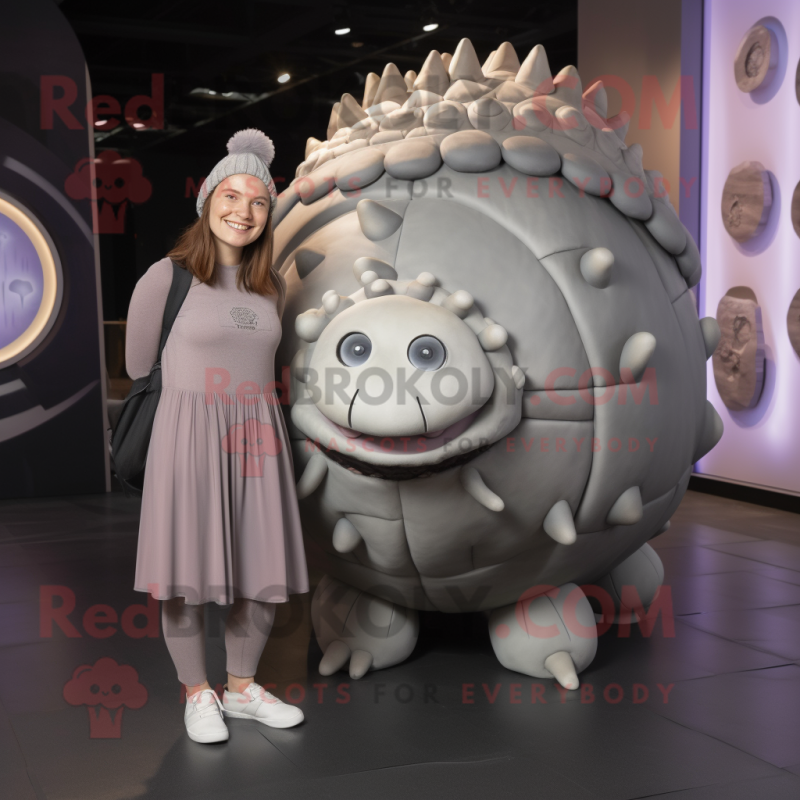 Silver Glyptodon mascot costume character dressed with a Mini Dress and Beanies Silver Glyptodon mascot costume character dressed with a Mini Dress and Beanies