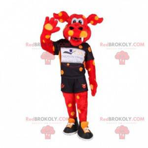 Mascotte drago rosso con punti gialli in abbigliamento sportivo