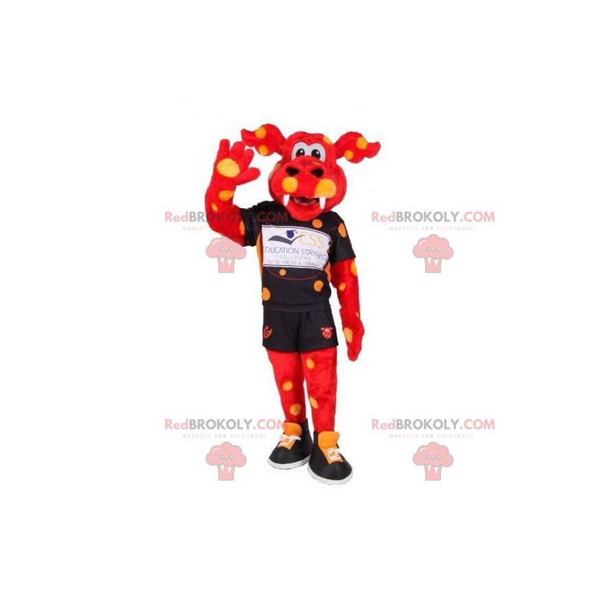 Mascotte de dragon rouge à pois jaunes en tenue de sport -