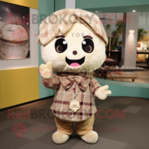 Tan Dim Sum mascot costume character dressed with a Flannel Shirt and Keychains