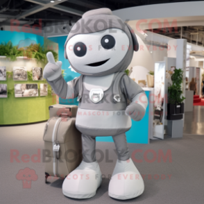 Gray Champagne mascot costume character dressed with a Romper and Messenger bags