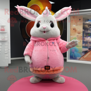 Pink Chinchilla mascot costume character dressed with a Sweater and Rings
